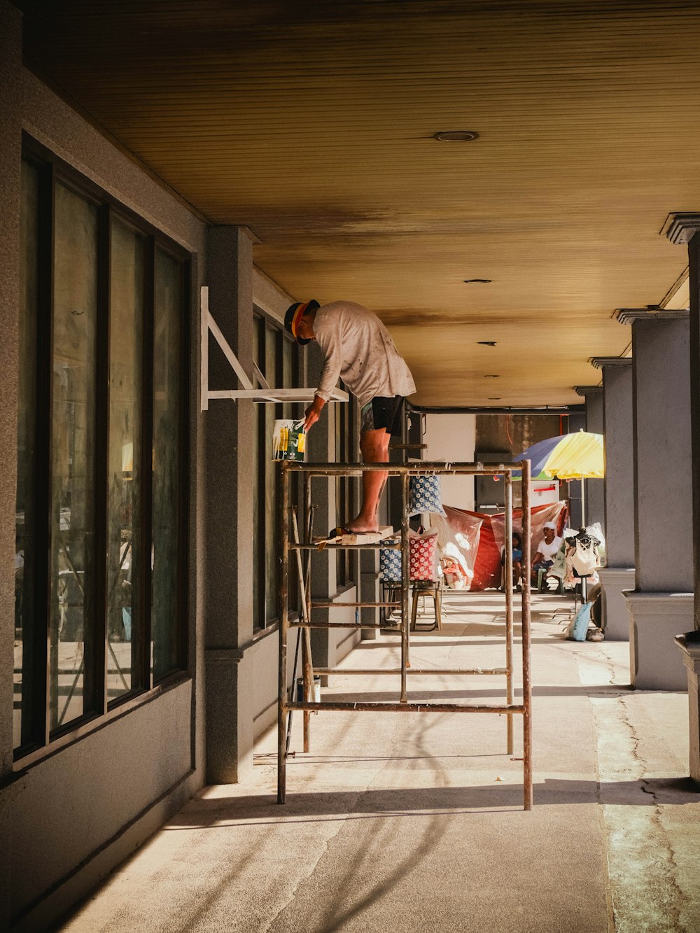 Photo: Joseph Sullan · Unsplash Portrait of a builder on a job site in natural light